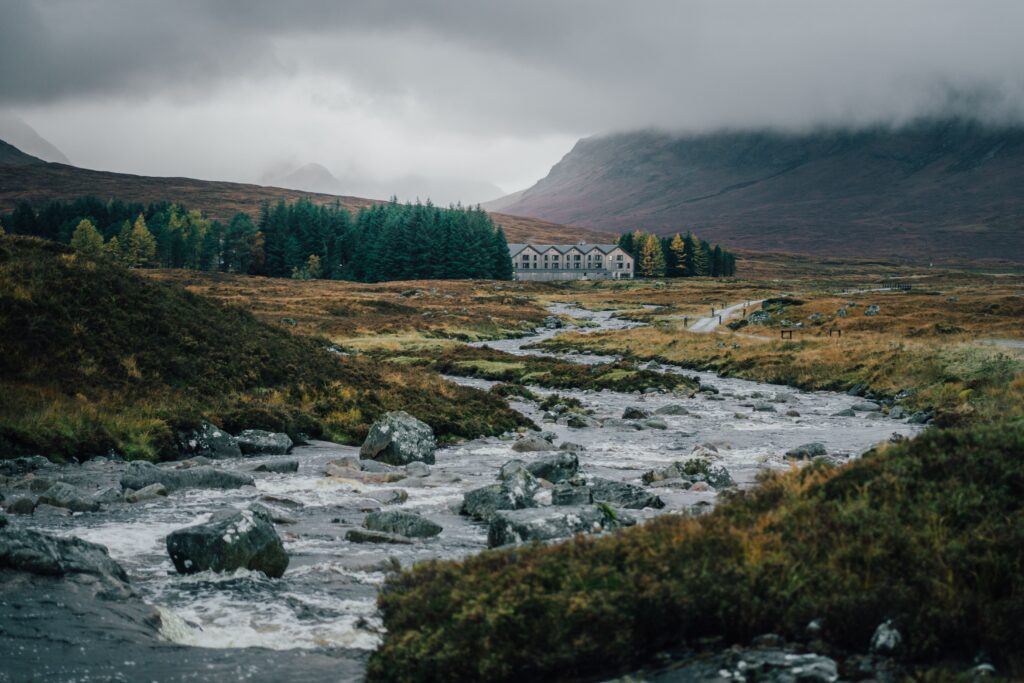 Scottish Highland river and mountain landscape representing adaptable leadership and business transformation. Livingston James specialises in Fractional Executive Leadership services, providing organisations across Scotland and the UK with high-calibre fractional executives, interim leaders and strategic leadership expertise.