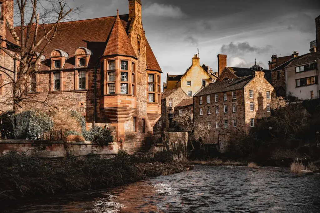 Historic Edinburgh cityscape overlooking a flowing river, representing operational leadership, business transformation and organisational resilience. Livingston James specialises in Chief Operating Officer executive search and Operations Leadership recruitment, connecting organisations across Scotland and the UK with high-calibre COO and operational executive talent.