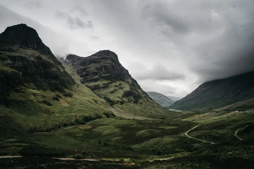 Scottish Highland landscape with winding paths through a mountain valley, representing strategic marketing leadership, audience engagement and commercial growth. Livingston James specialises in Chief Marketing Officer executive search and Marketing Leadership recruitment, connecting organisations across Scotland and the UK with high-calibre marketing executives.