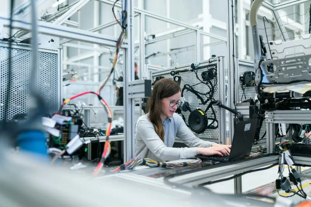 Engineer working within an advanced technology and automation environment, representing digital innovation, engineering leadership and product development. Livingston James provides technology executive search services to software, engineering, AI and technology organisations across Scotland and the UK.